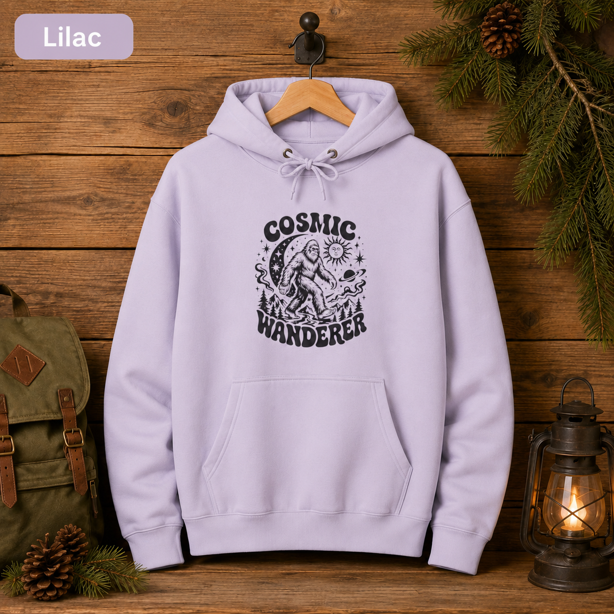 Cosmic Wanderer Sasquatch Hoodie, Retro Celestial Bigfoot Sweatshirt, Outdoorsy Camp Hoodie, Lane Seven Three-Panel Fleece Hoodie